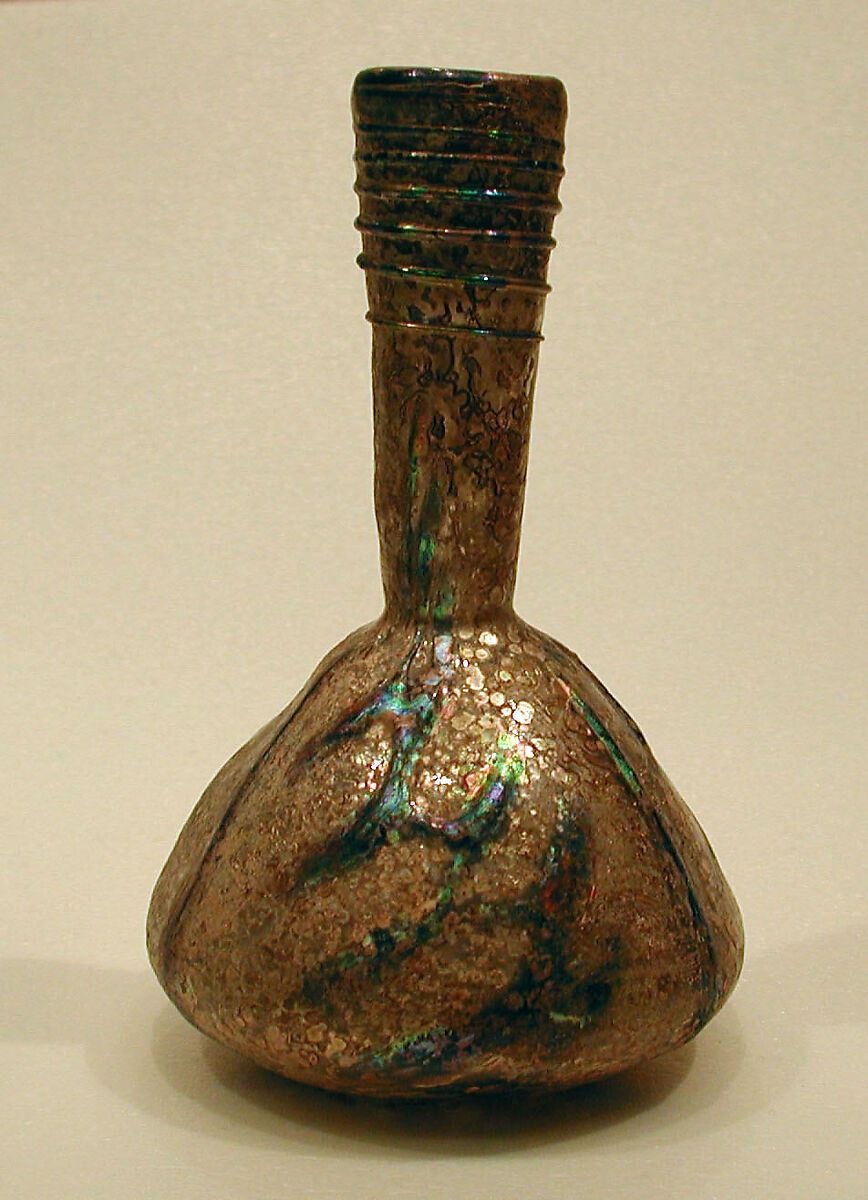 Bottle with Spiraled and Zigzag Trails, Glass, colorless; blown, applied ring foot, applied blue decoration 