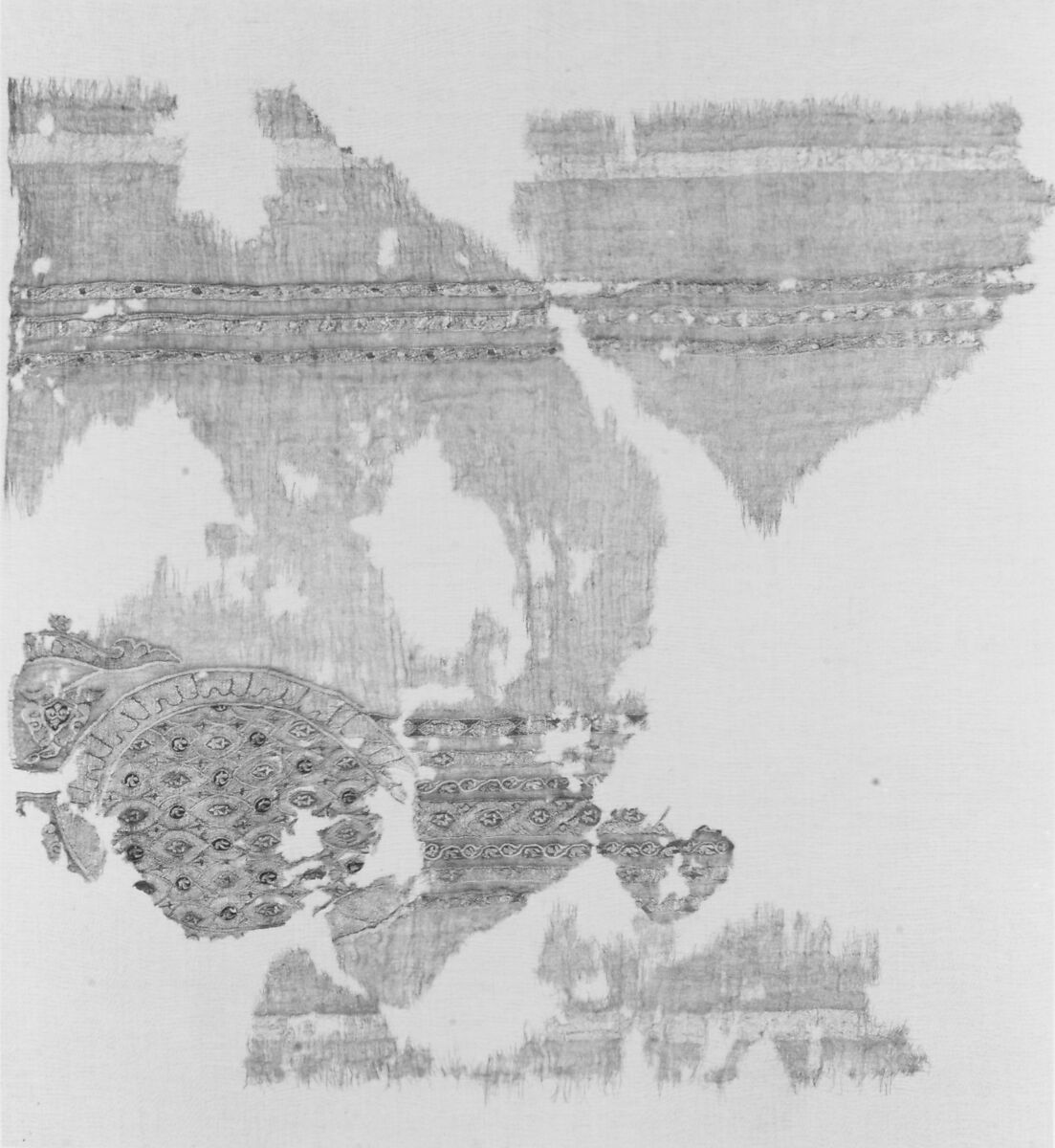 Portion of a Garment with Geometric Patterns, Linen, silk, metal wrapped thread; plain weave, tapestry weave