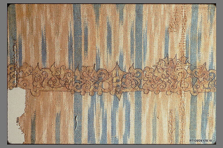 Tiraz Fragment from an Ikat Shawl, Cotton, ink, gold; plain weave, resist-dyed (ikat), painted