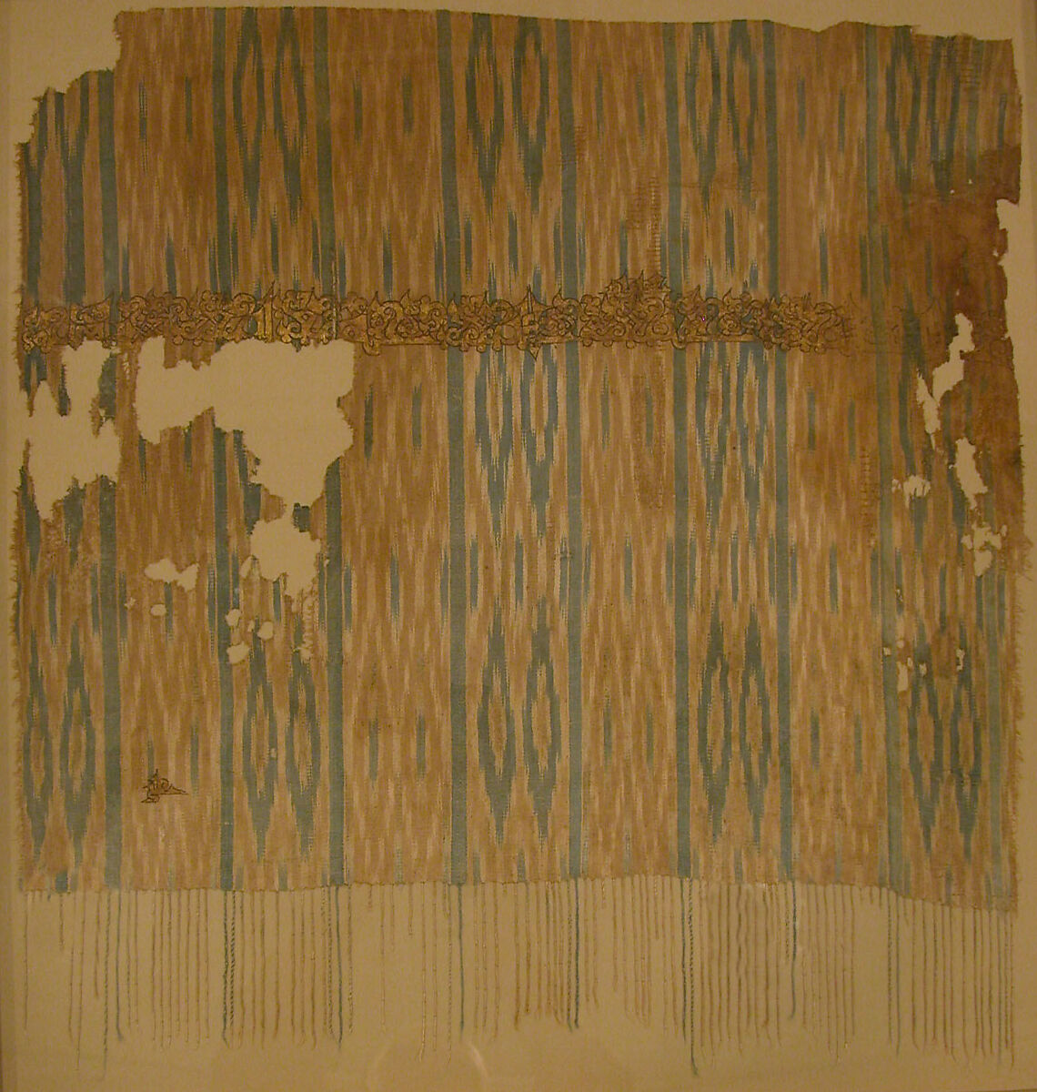 Tiraz Fragment from an Ikat Shawl, Cotton, ink, gold; plain weave, resist-dyed (ikat), painted