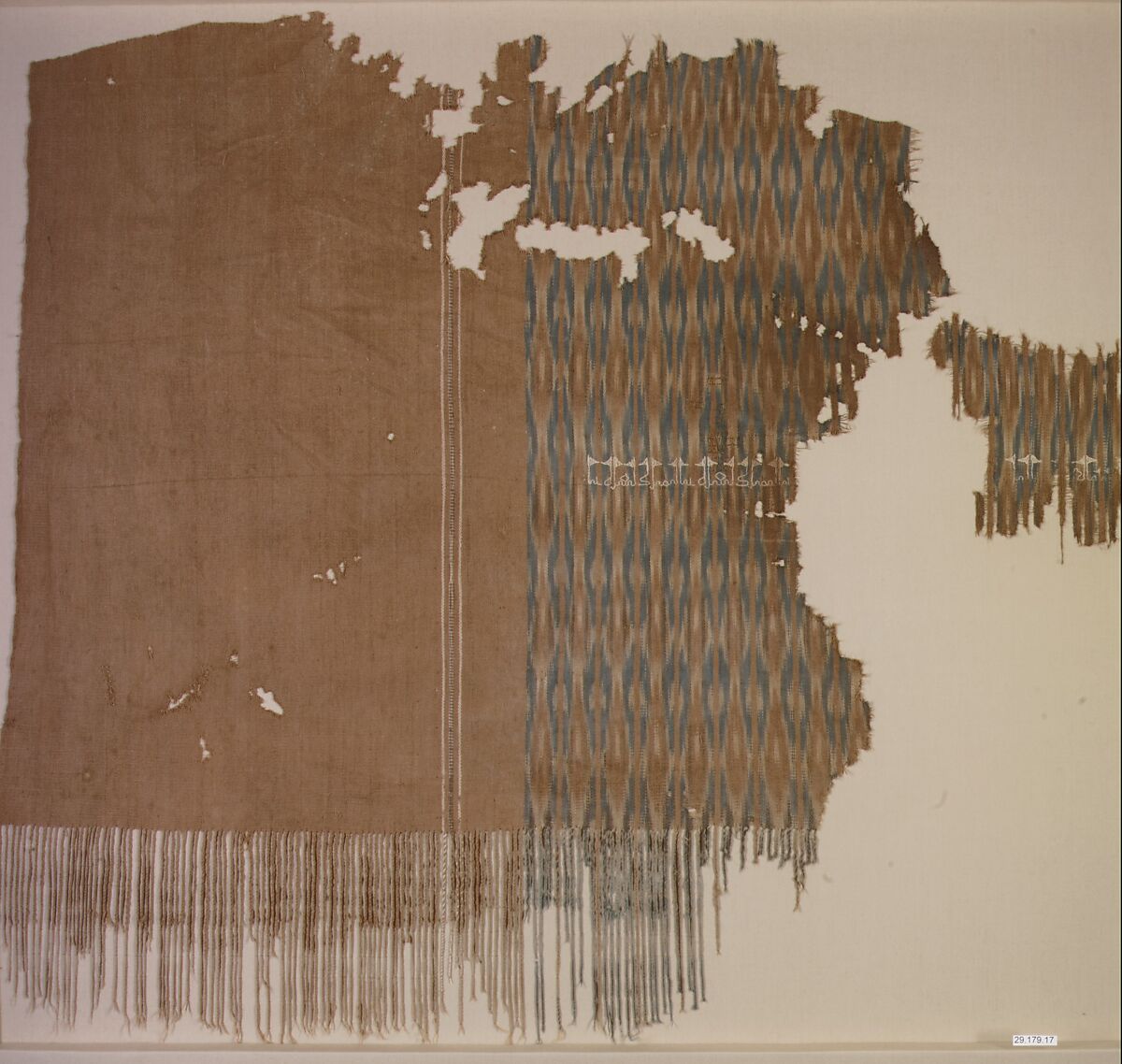 Fragment of an Embroidered Textile, Cotton; plain weave, resist-dyed (ikat), embroidered 