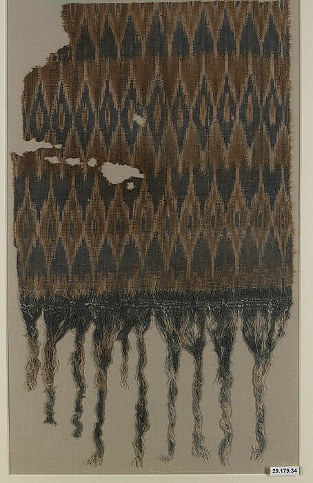 Textile Fragment, Cotton; plain weave, resist-dyed (ikat), embroidered