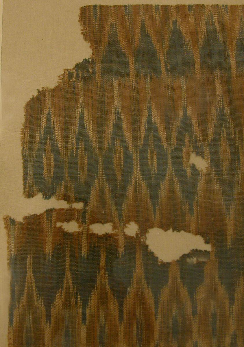 Textile Fragment, Cotton; plain weave, resist-dyed (ikat), embroidered