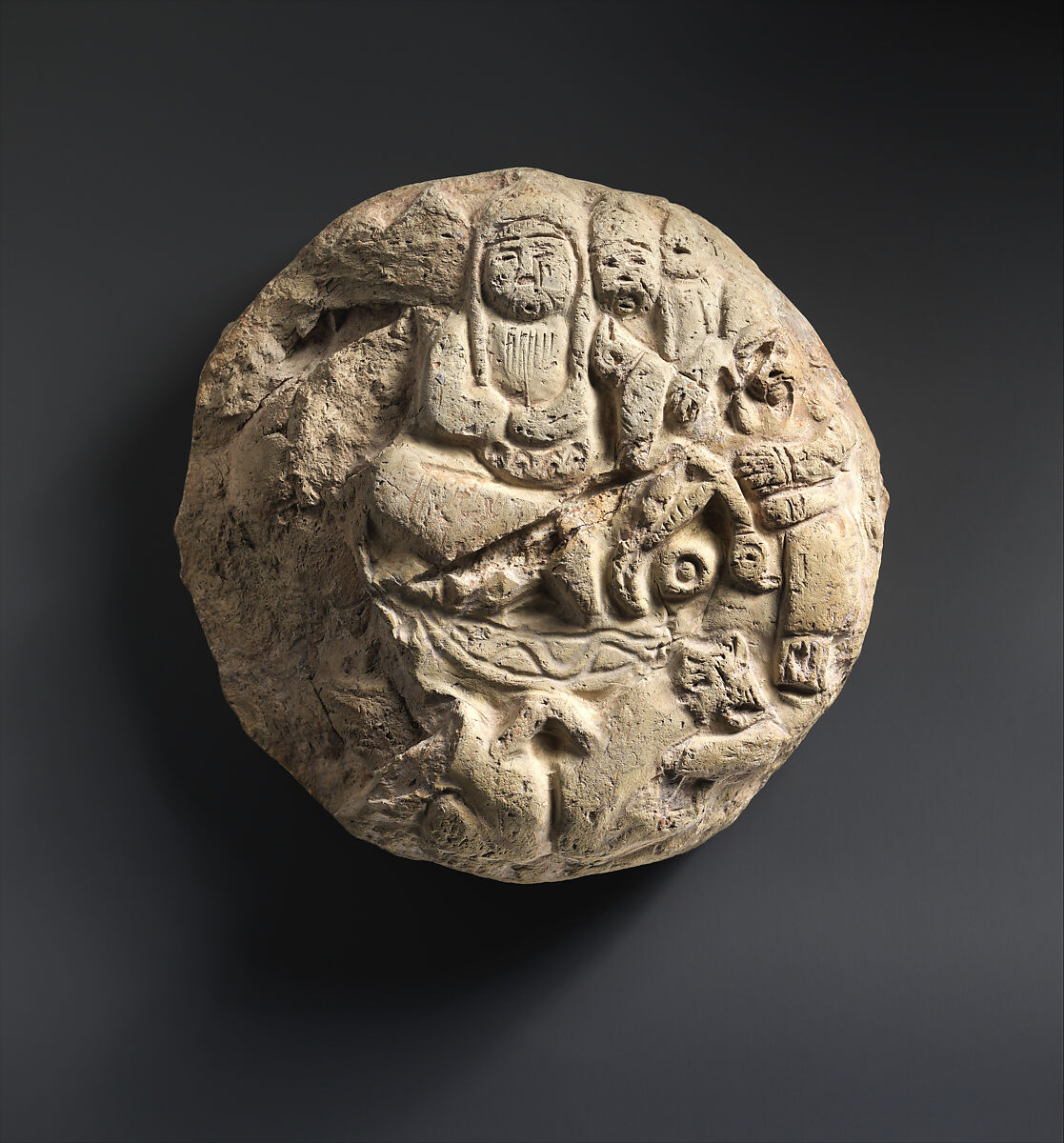 Medallion with Enthroned Figure and Attendants, Earthenware; carved 