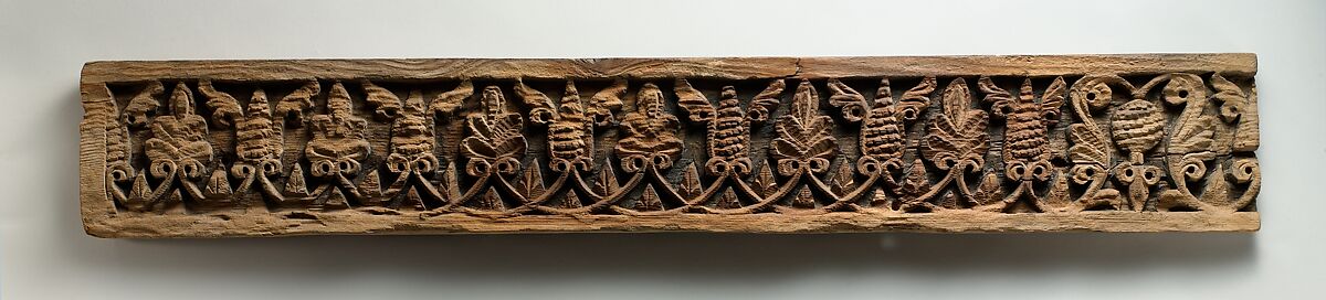 Fragment of a Frieze with Winged Pinecones and Palmettes, Wood; carved 