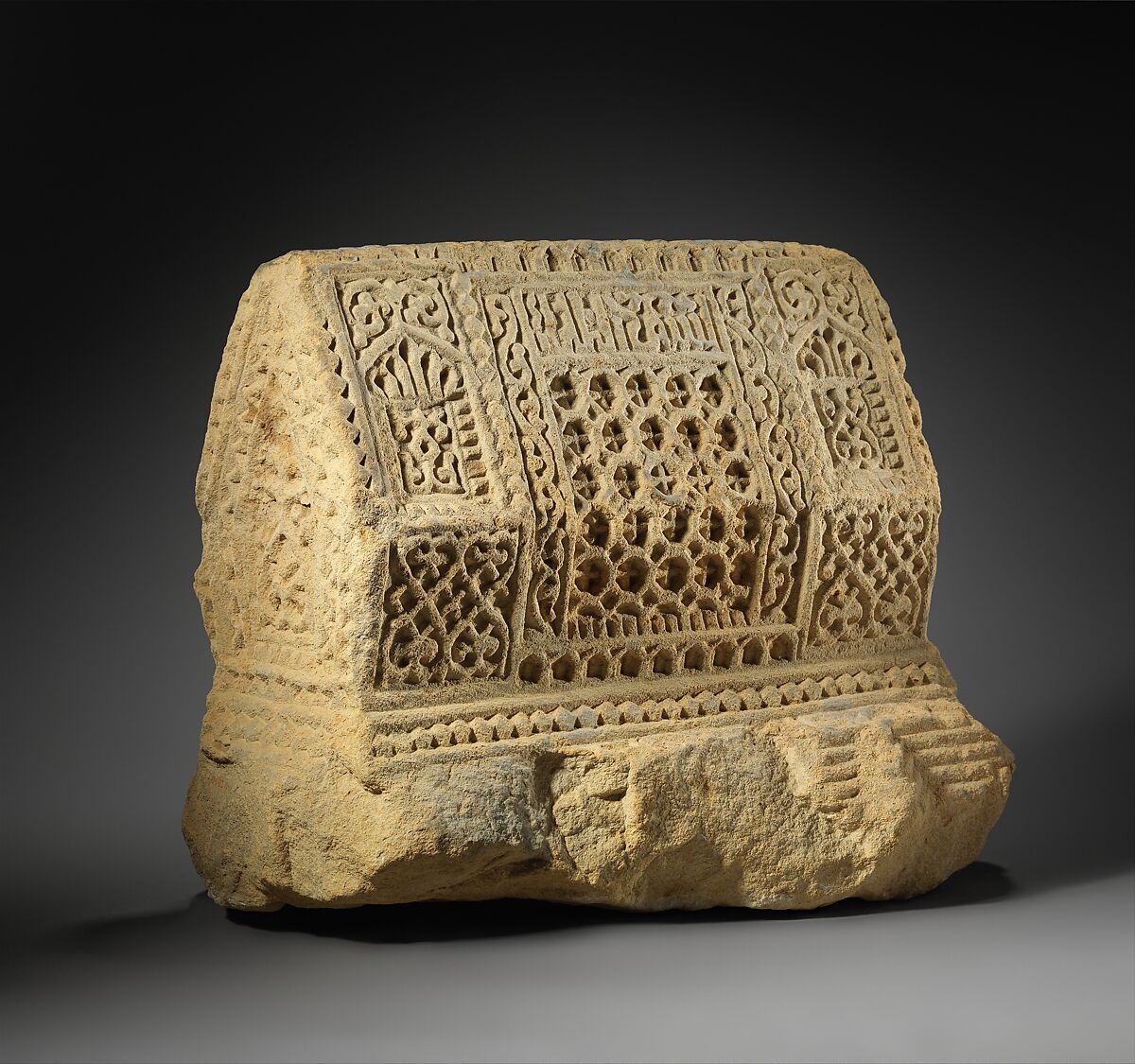 Tomb Marker, in the Shape of a Stepped Trapezoidal Prism, Limestone; carved in relief