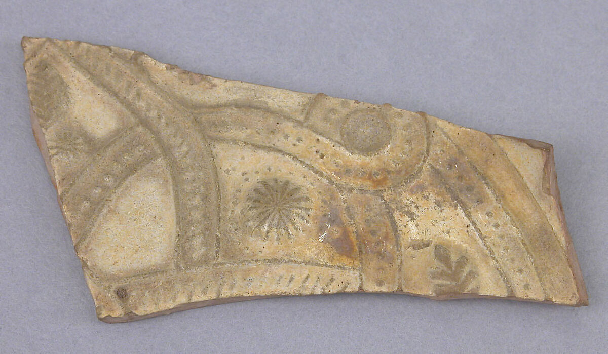 Fragment with Interlace Design, Earthenware; molded and glazed 