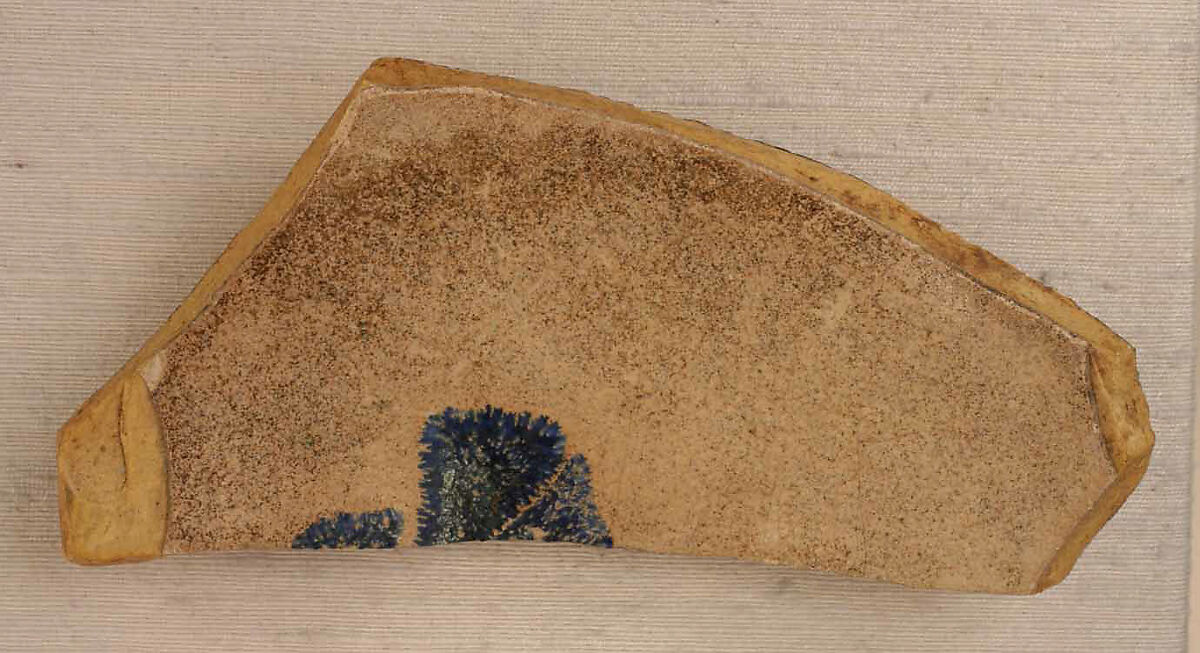 Fragment of an Open Vessel with Blue on White Motif, Earthenware; in-glaze painted in blue on opaque white glaze 
