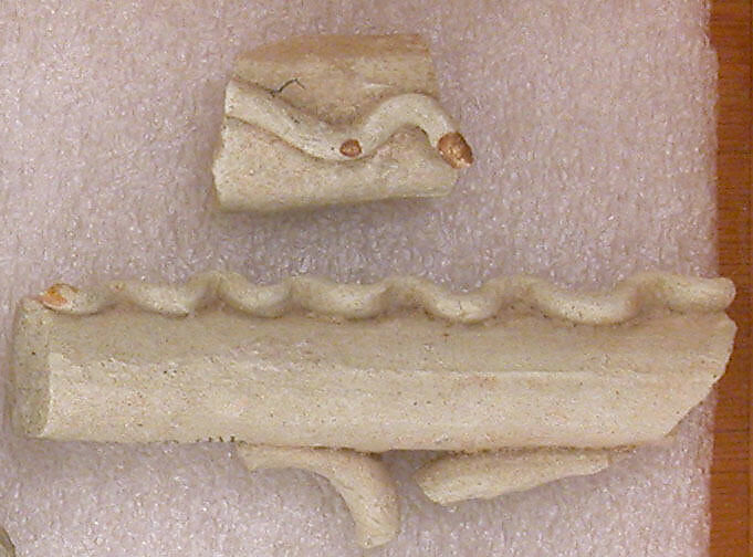 Fragment of a Handle with Wavy Band, Earthenware; molded and applied 