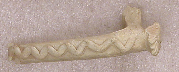 Fragment of a Handle with Wavy Band and Rosette-Shaped Thumb Rest, Earthenware; molded and applied 