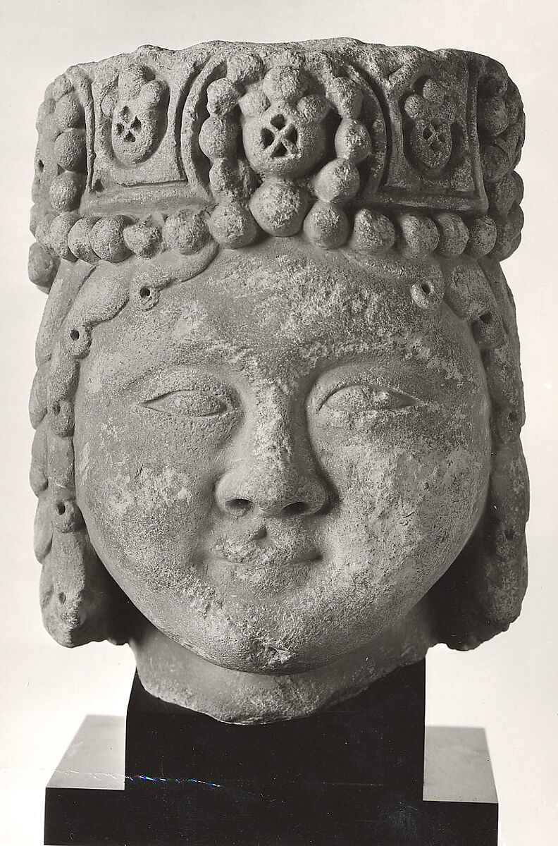 Head from a Figure with a Beaded Headdress, Fossiliferous limestone; carved, drilled