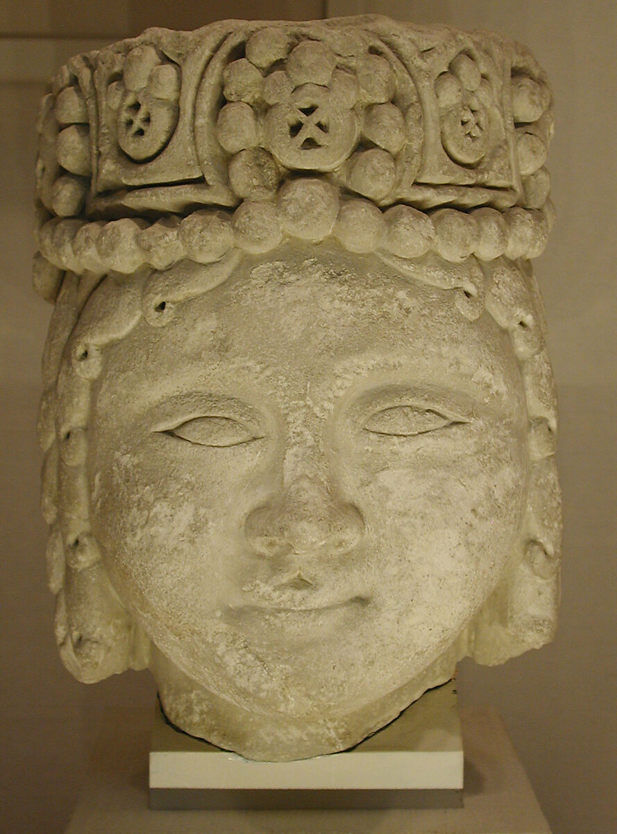 Head from a Figure with a Beaded Headdress, Fossiliferous limestone; carved, drilled