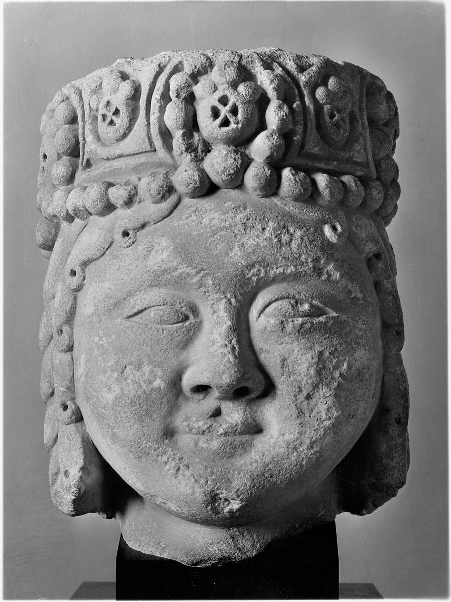 Head from a Figure with a Beaded Headdress, Fossiliferous limestone; carved, drilled