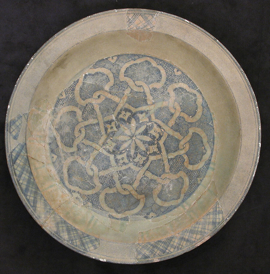 Dish, Earthenware; white slip with monochrome slip decoration under transparent glaze 