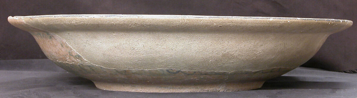 Dish, Earthenware; white slip with monochrome slip decoration under transparent glaze