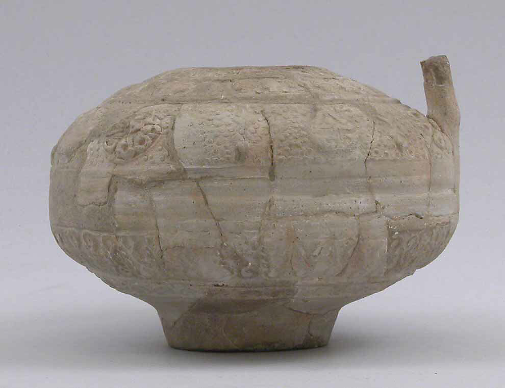 Jug, Earthenware; slip covered with molded decoration