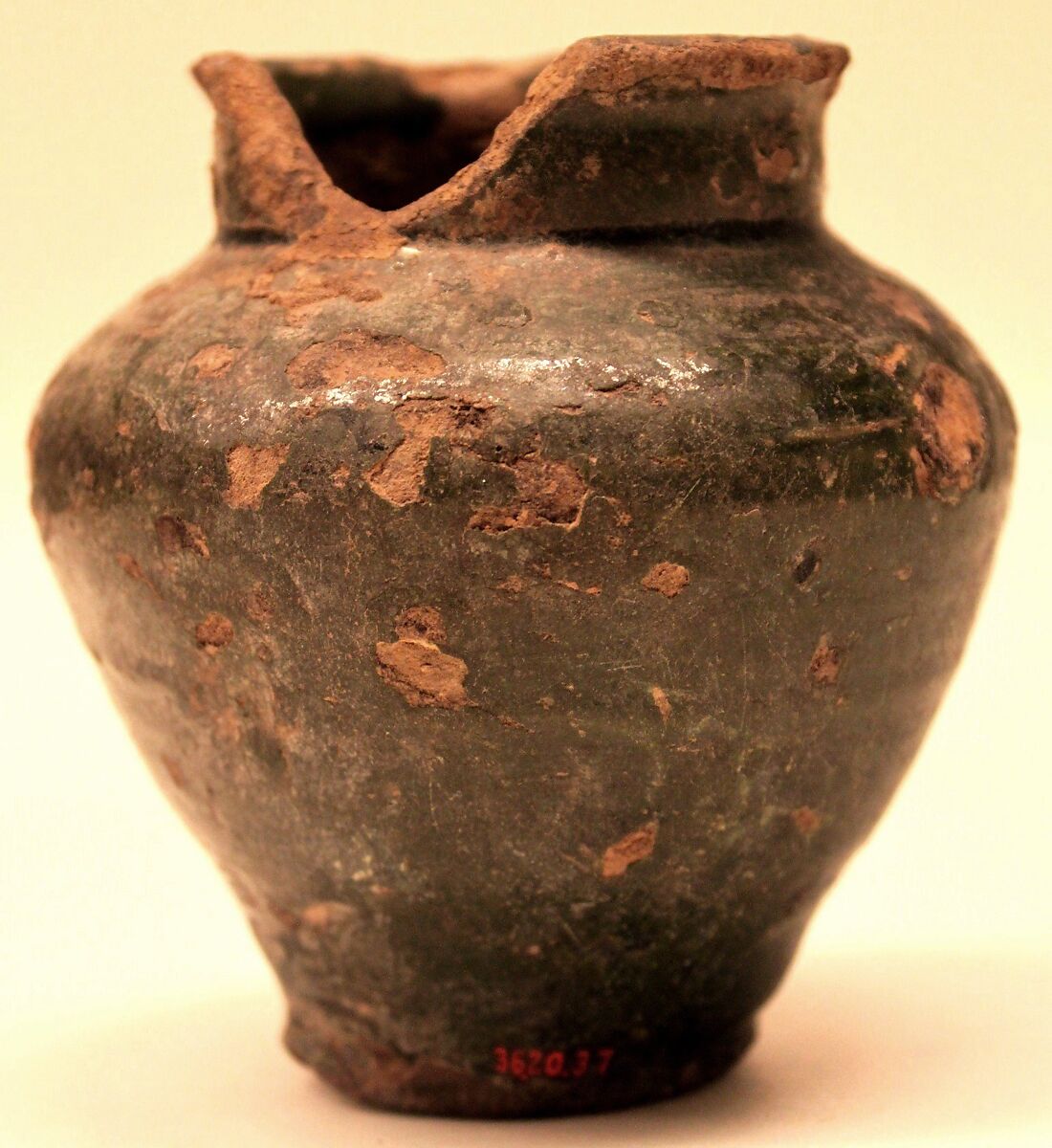 Jar, Earthenware; under dark green glaze 