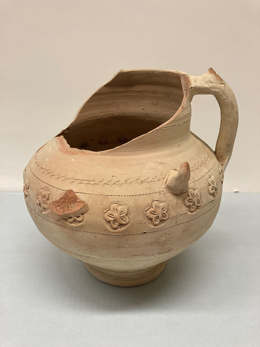 Jug, Earthenware; applied, stamped and incised decoration, unglazed
