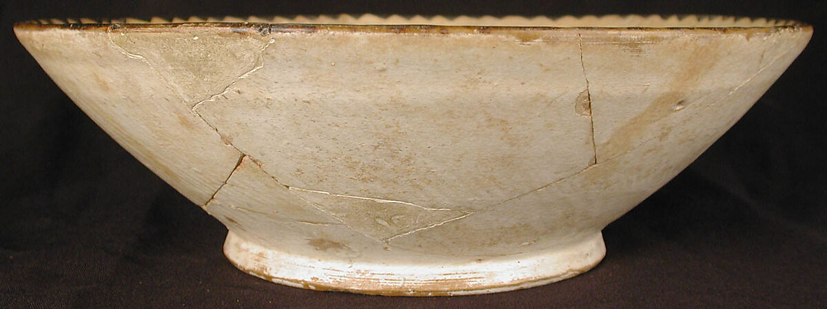Bowl, Earthenware; slip covered with black decoration under transparent glaze