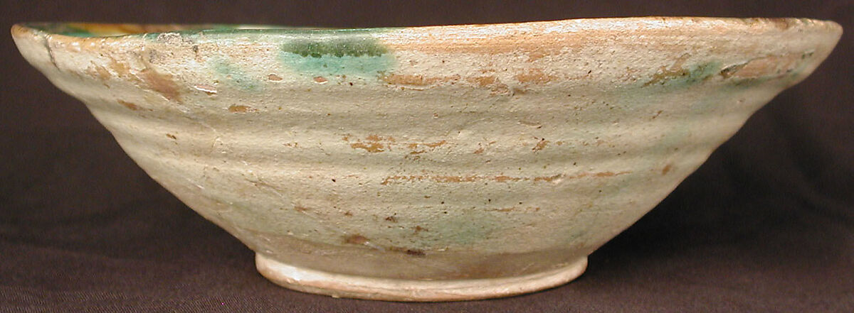 Bowl, Earthenware; white slip with polychrome painted decoration under transparent glaze