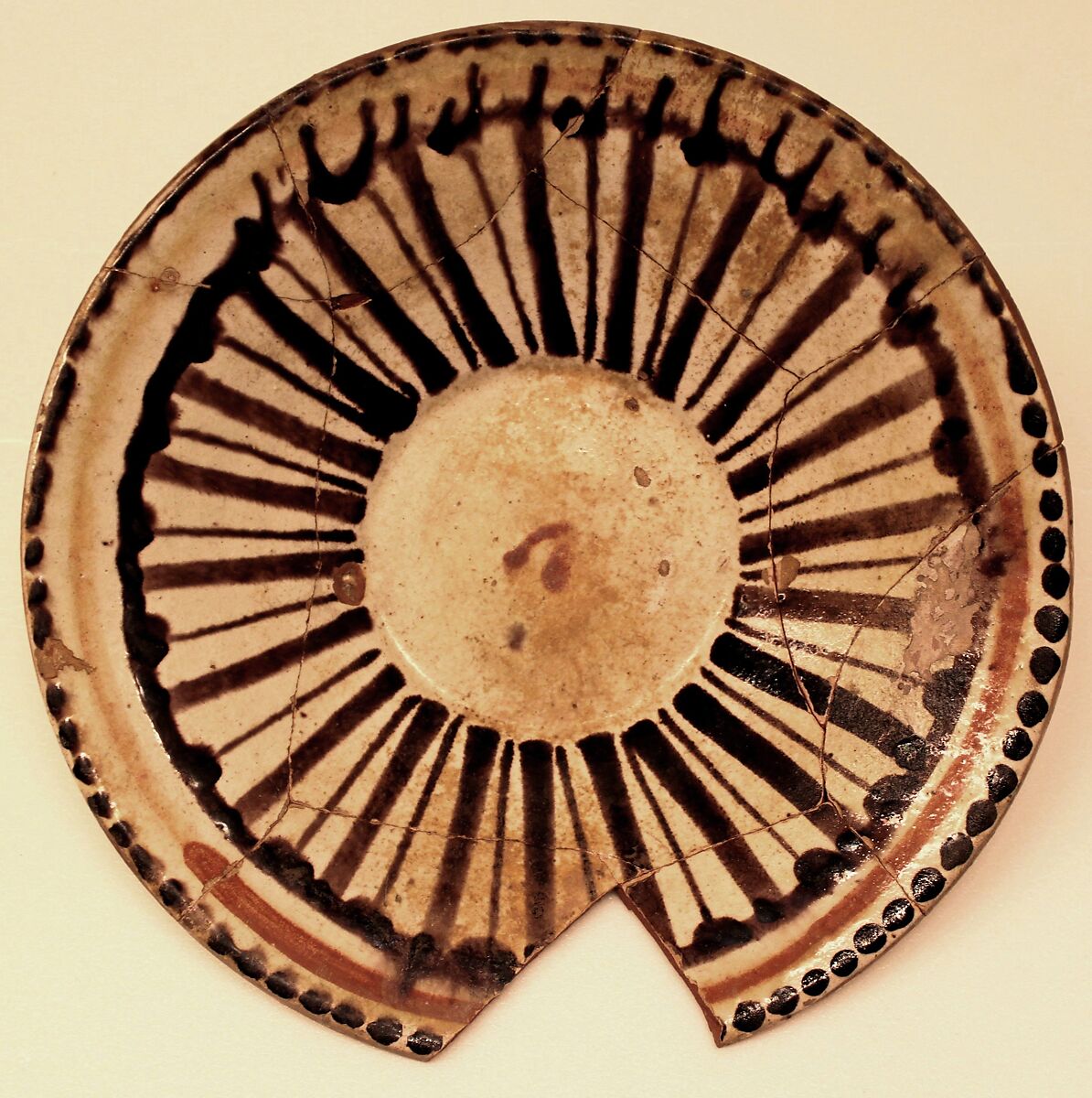 Dish, Earthenware; white slip with polychrome decoration under transparent glaze 