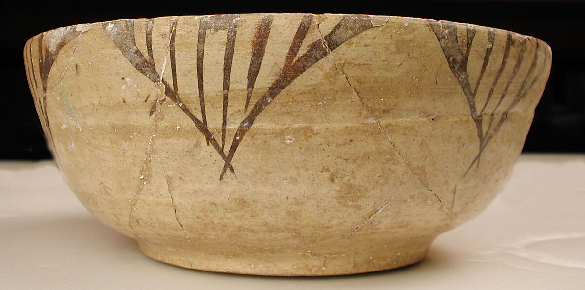 Bowl with Interlace Pattern and Yellow Flowers, Earthenware; polychrome decoration under transparent glaze (buff ware)