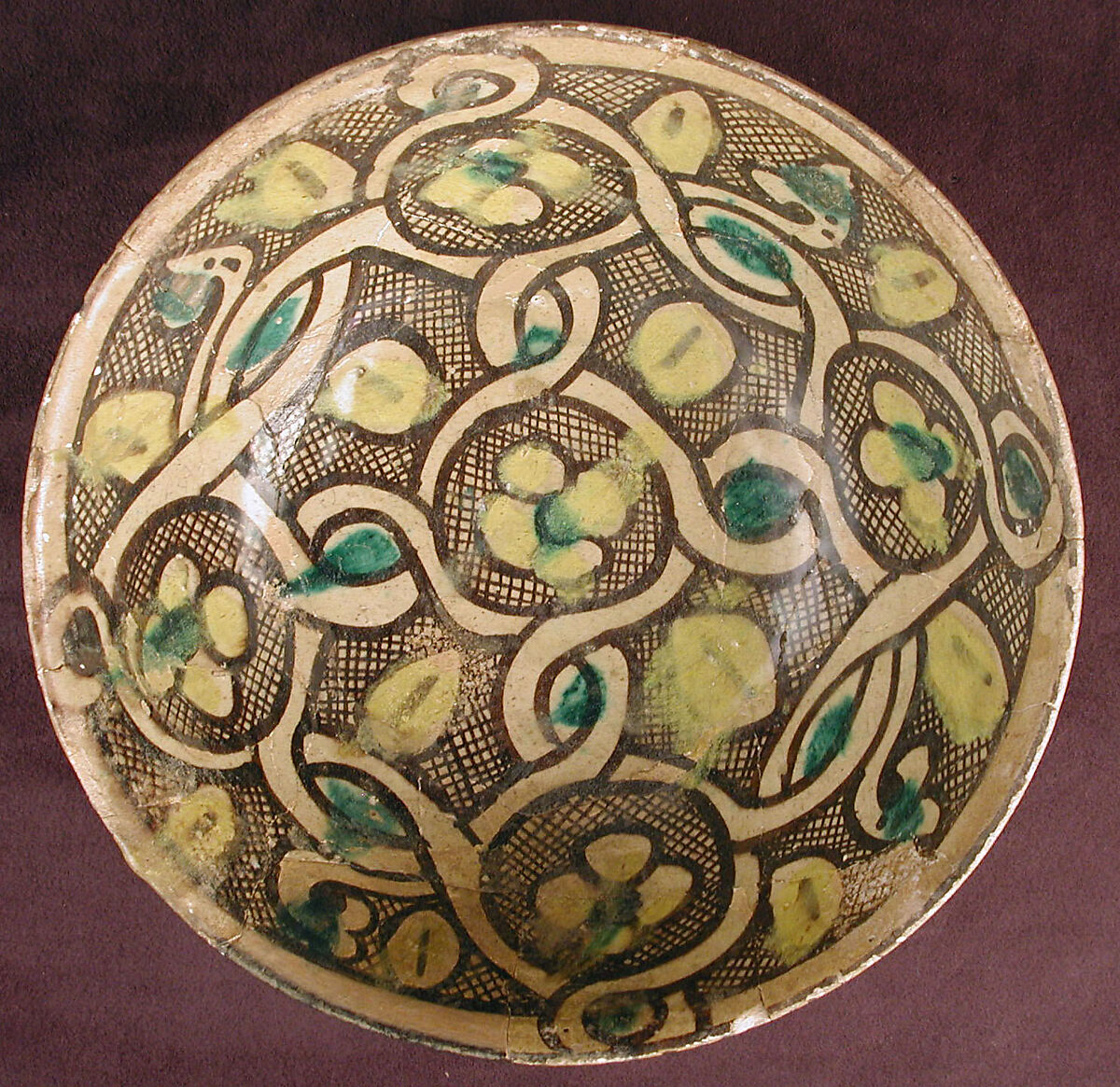 Bowl with Interlace Pattern and Yellow Flowers, Earthenware; polychrome decoration under transparent glaze (buff ware)
