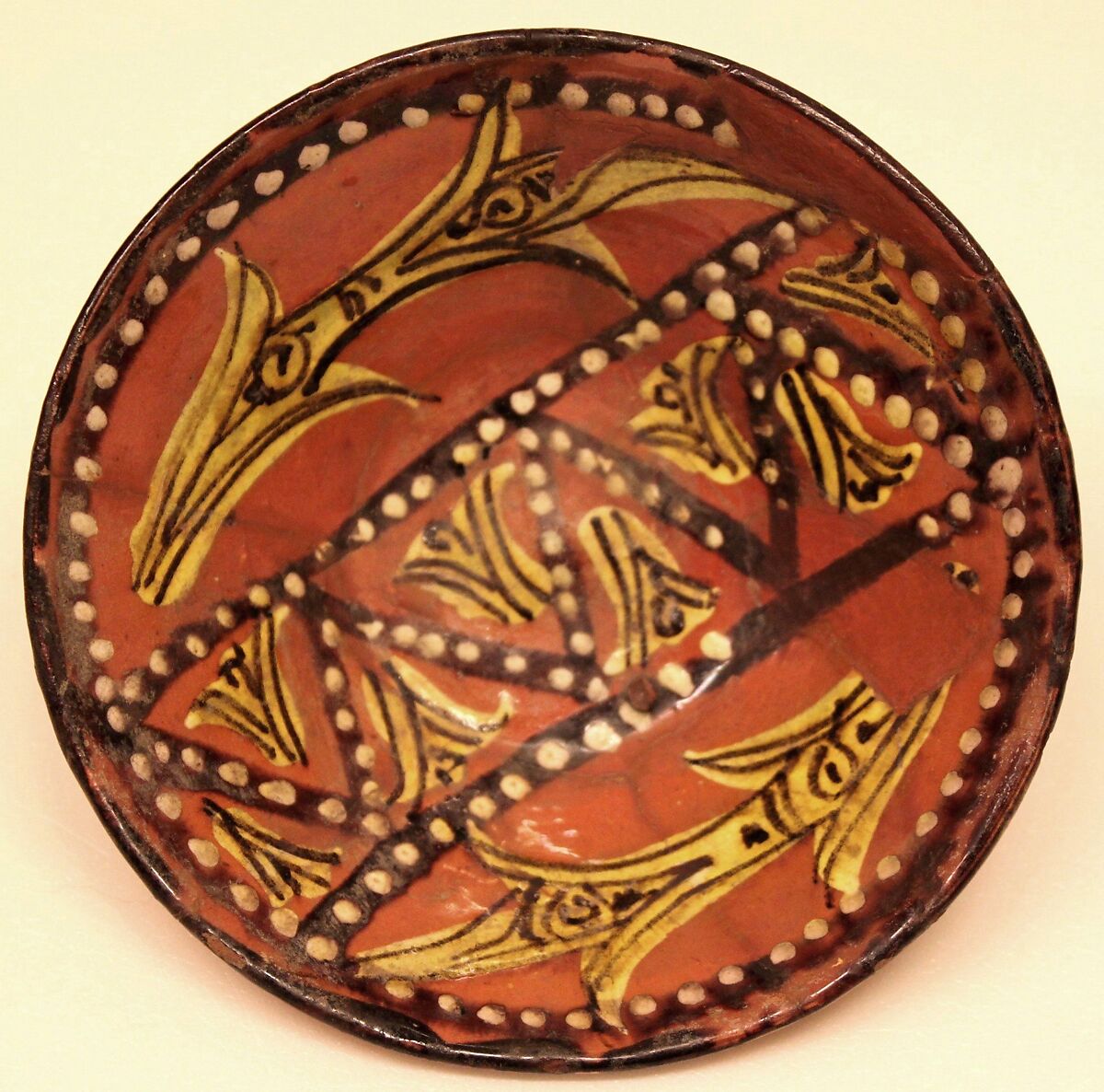 Bowl, Earthenware; red slip covered and polychrome painted under transparent glaze 