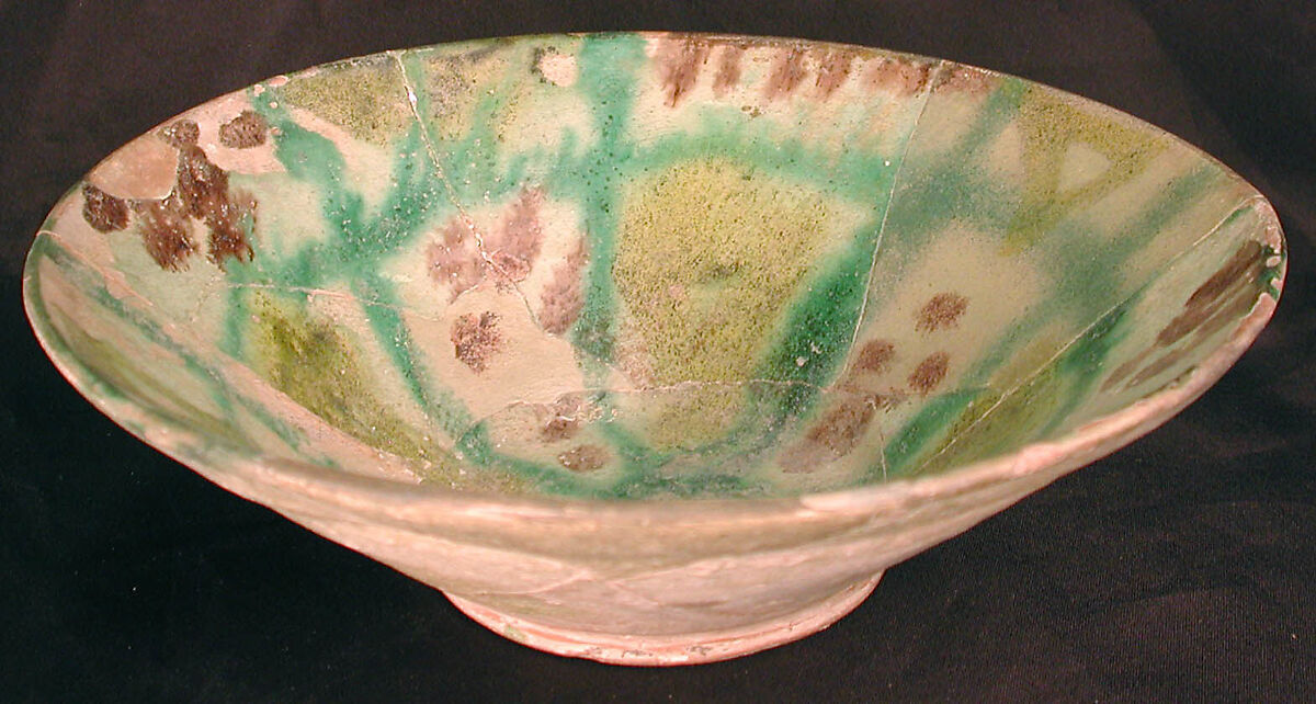 Bowl, Earthenware; white-slip covered with polychrome slip decoration under transparent glaze