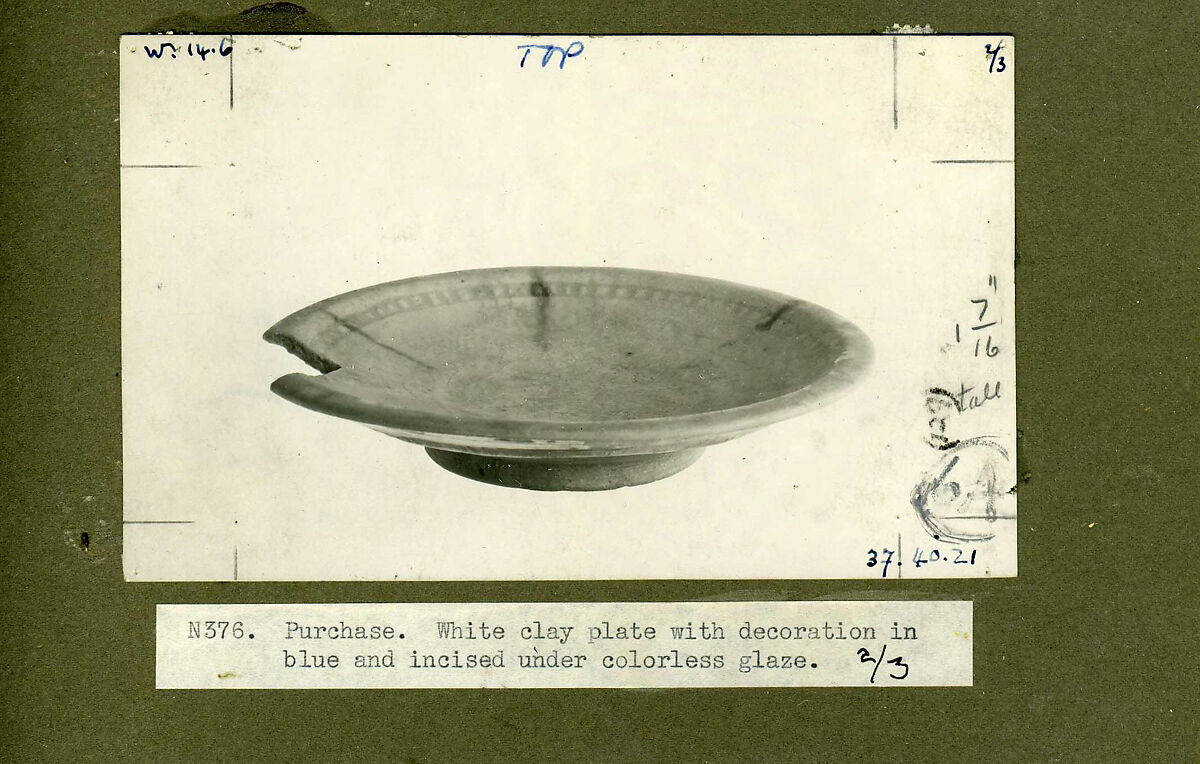 Dish, Stonepaste; colorless, iridescent glaze; gritty, white,body; restored.