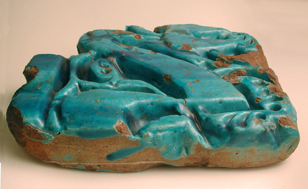 Tile Fragment, Stonepaste; carved decoration under opaque monochrome glaze