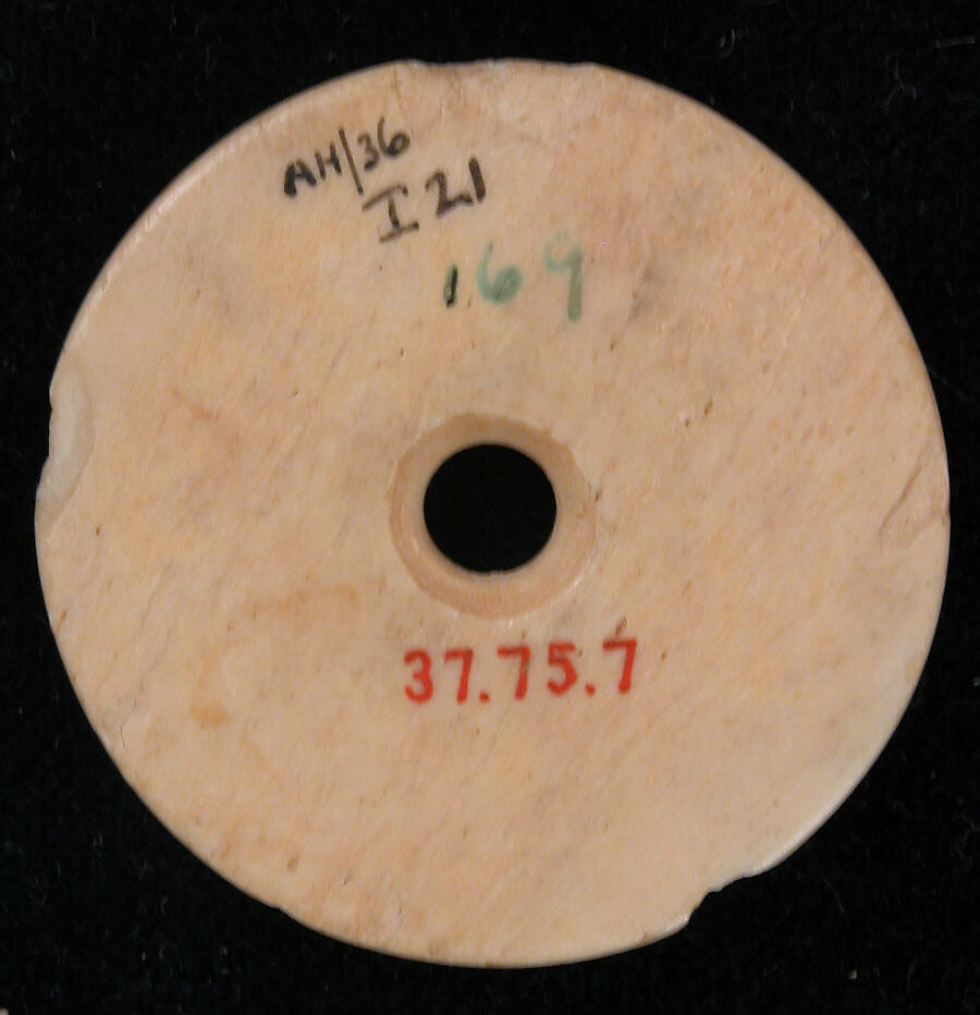 Spindle Whorl or Button, Bone; incised