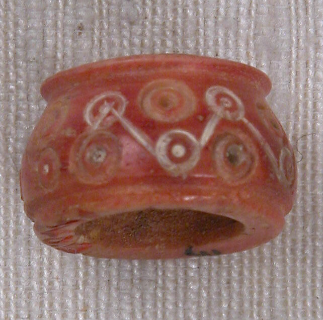 Button, Bone; tinted, incised, and inlaid with paint