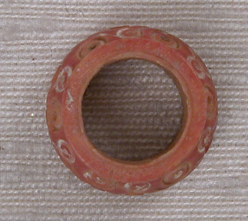 Button, Bone; tinted, incised, and inlaid with paint