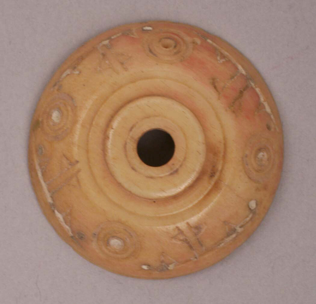 Button or Spindle Whorl, Bone; tinted, incised, and inlaid with paint 