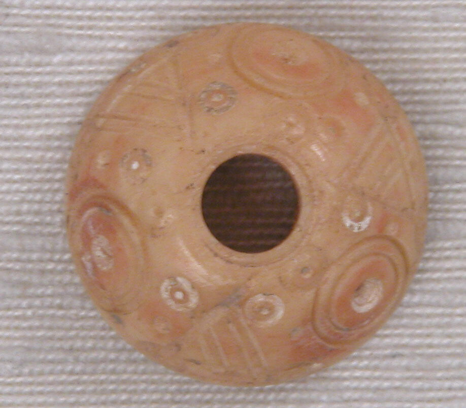 Button or Bead or Spindle Whorl, Bone; tinted, incised and inlaid with paint