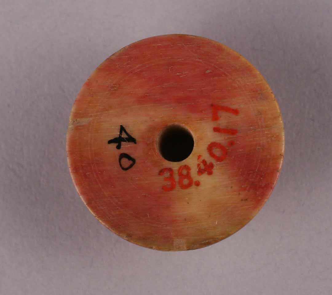 Spindle Whorl, Bone; tinted, incised, and inlaid with paint