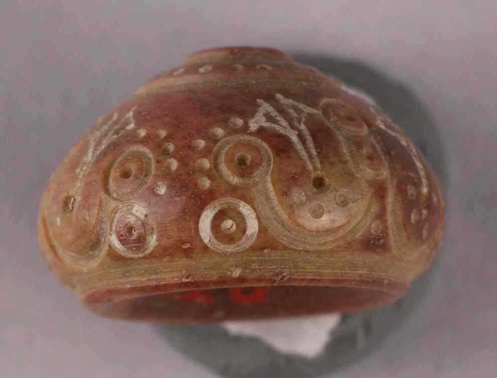 Button or Bead, Bone; tinted, incised, and inlaid with paint