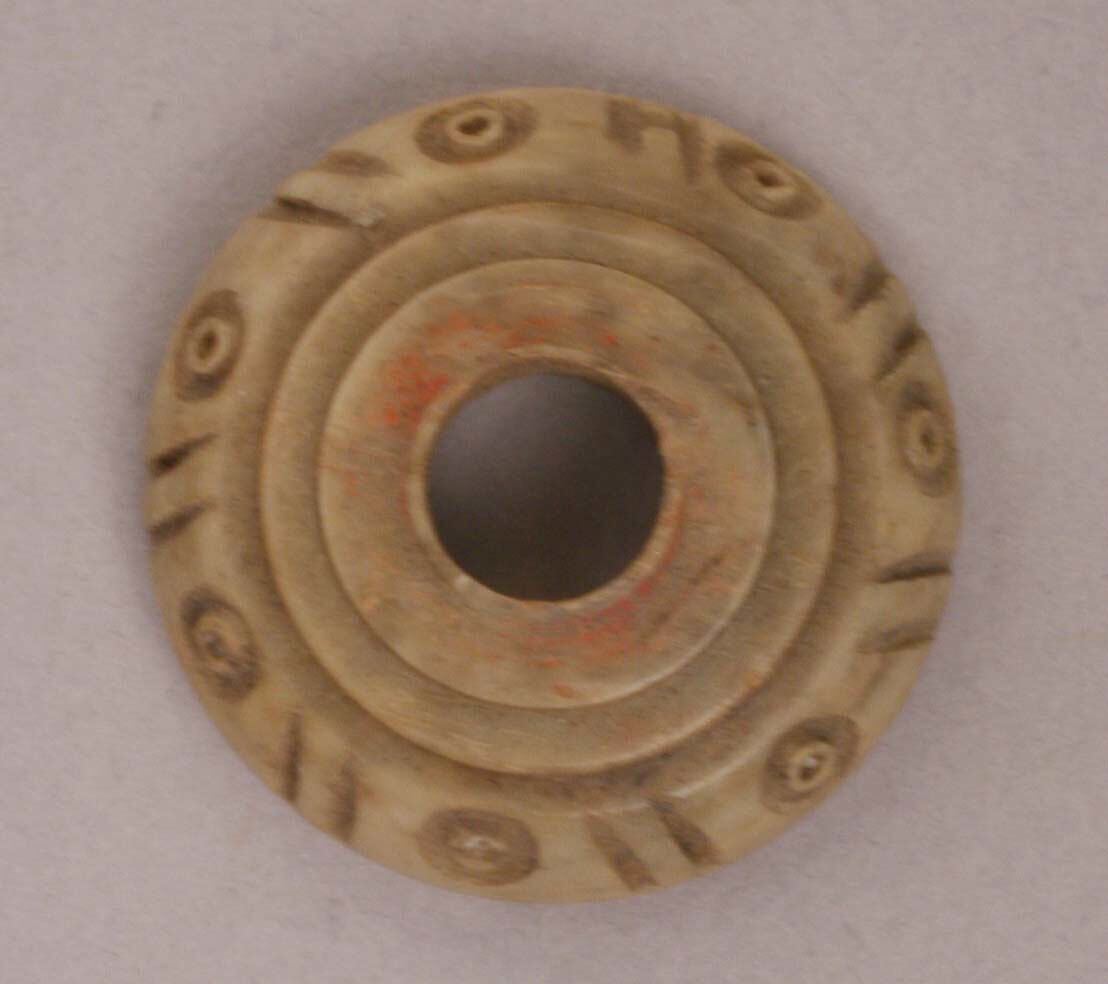 Button or Bead, Bone; tinted, incised, and inlaid with paint 