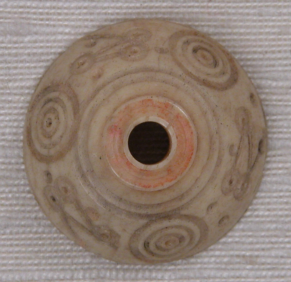 Button or Spindle Whorl, Bone; tinted, incised, and inlaid with paint