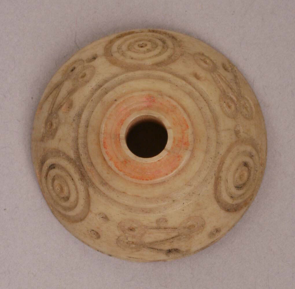 Button or Spindle Whorl, Bone; tinted, incised, and inlaid with paint 