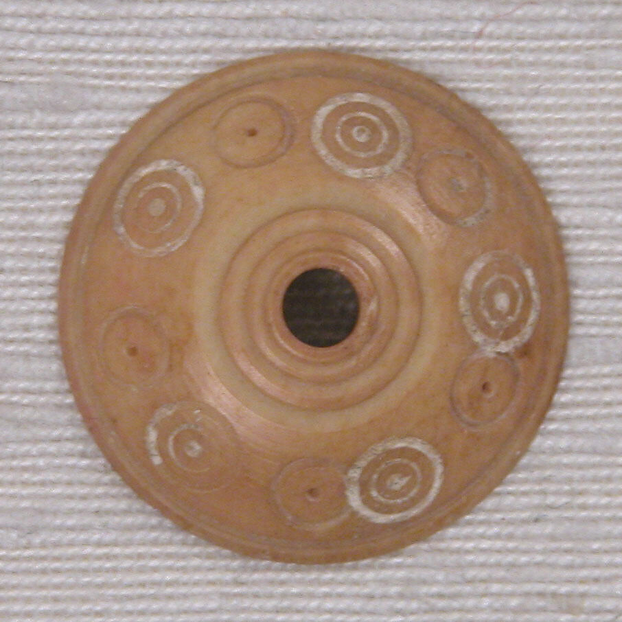 Button or Bead, Bone; tinted, incised, and inlaid with paint
