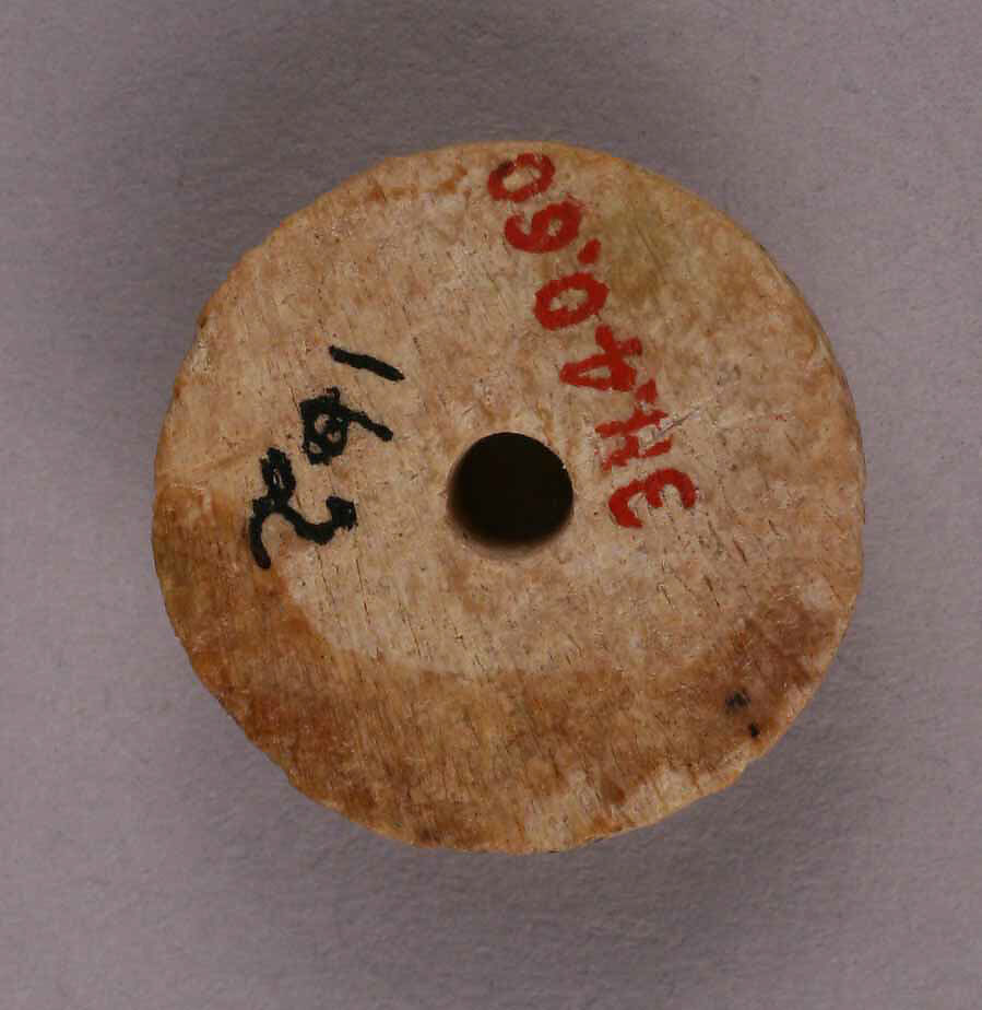 Button or Bead, Bone; tinted, incised, and inlaid with paint