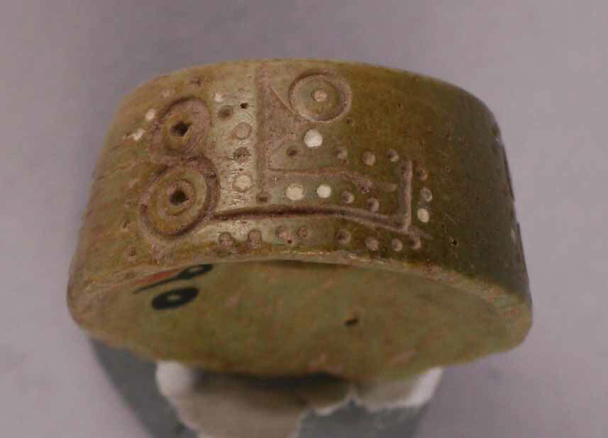 Button or Bead, Bone; tinted, incised, and inlaid with paint