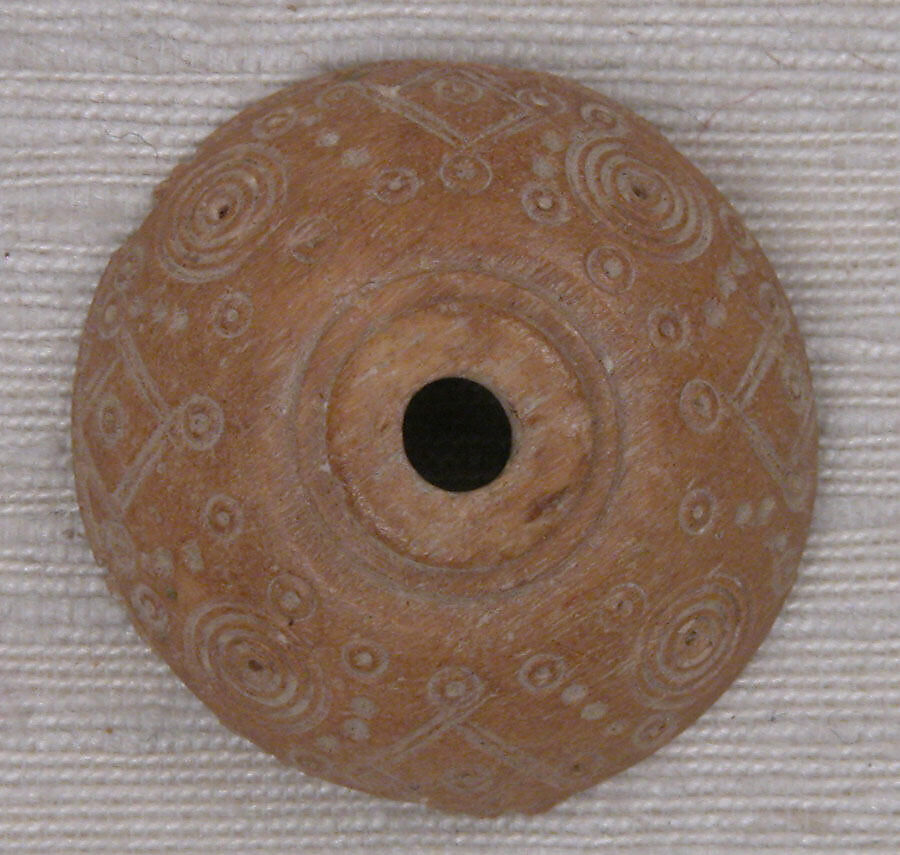 Button or Spindle Whorl, Bone; tinted, incised, and inlaid with paint