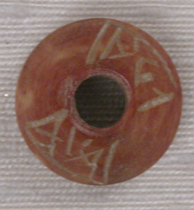 Button or Bead, Bone; tinted, incised