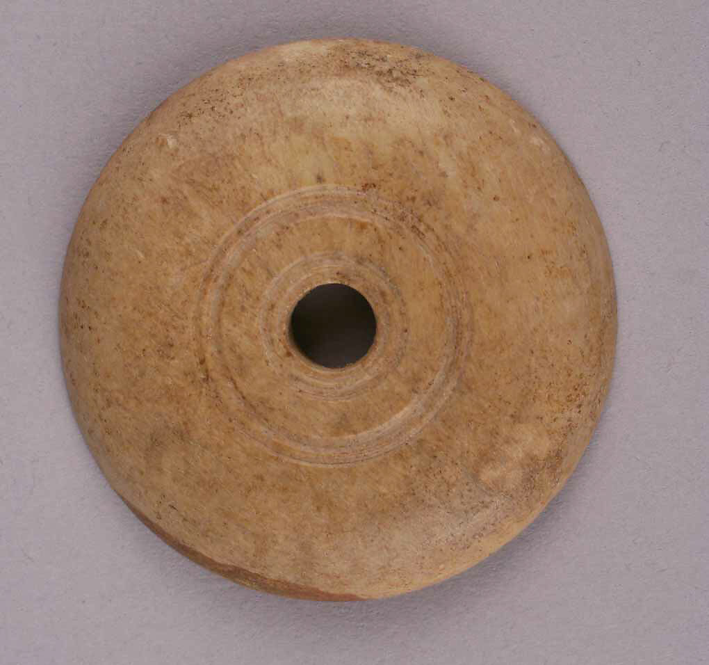 Spindle Whorl, Bone; incised 