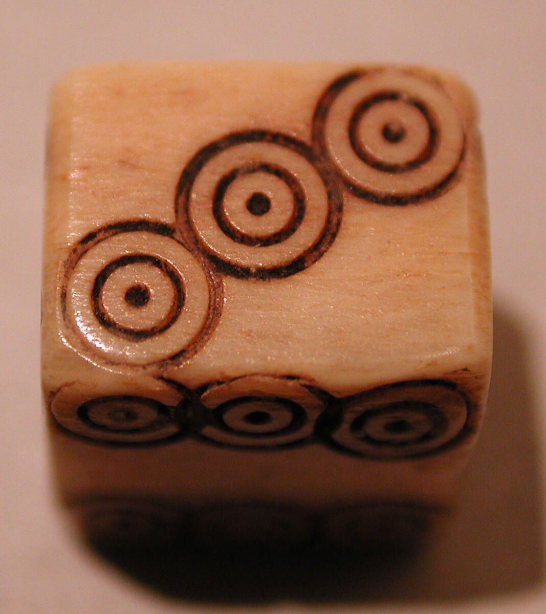 Dice, Ivory or bone; incised and inlaid with paint 