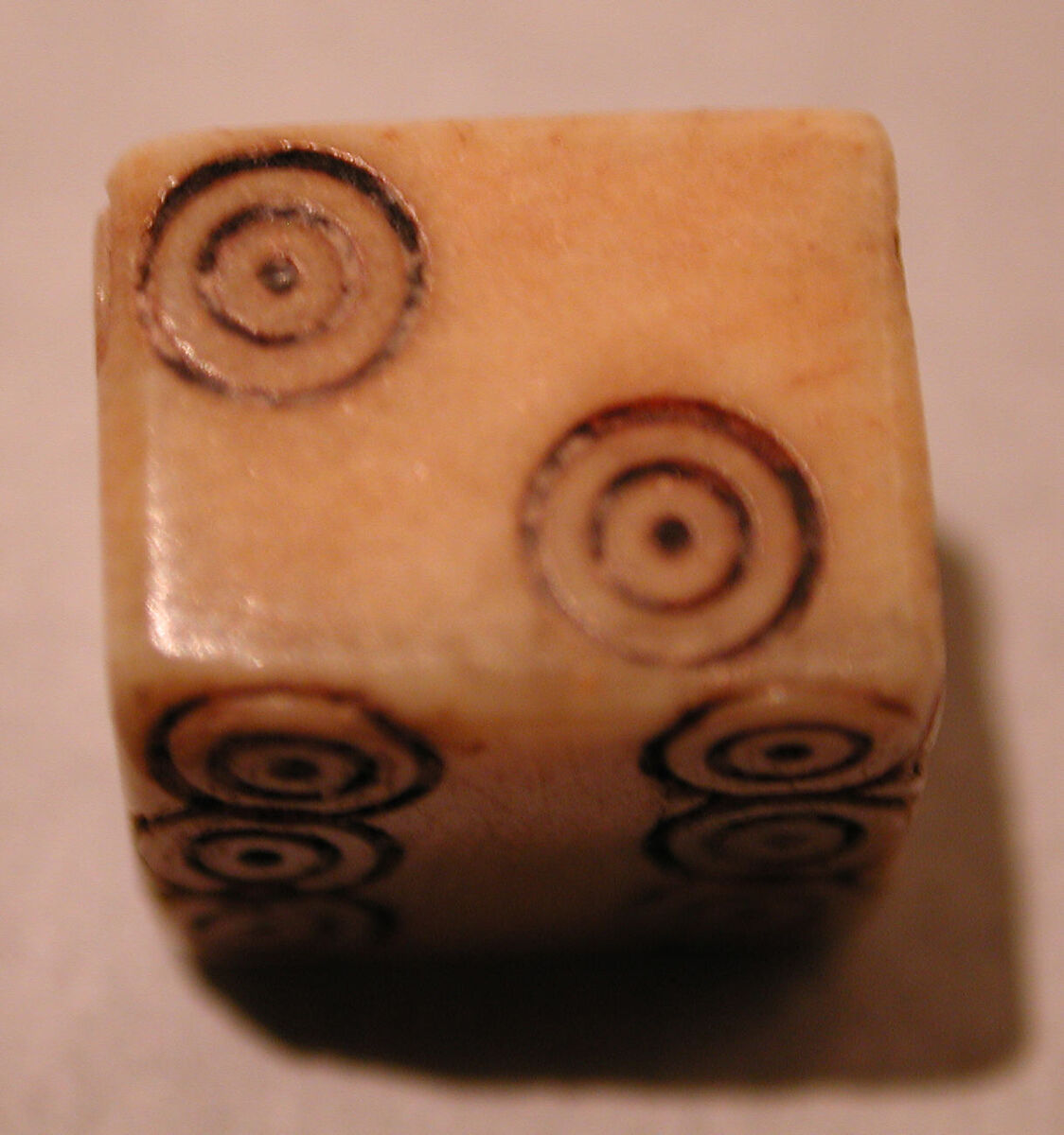 Dice, Ivory or bone; incised and inlaid with paint