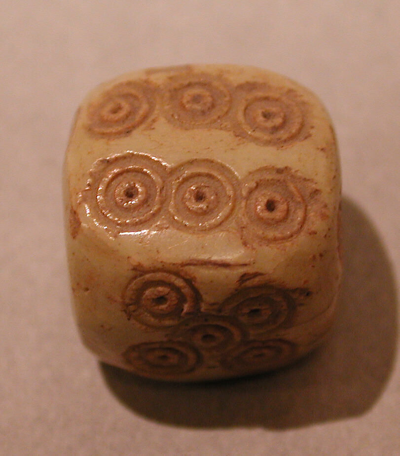 Dice, Ivory or bone; incised and inlaid with paint 